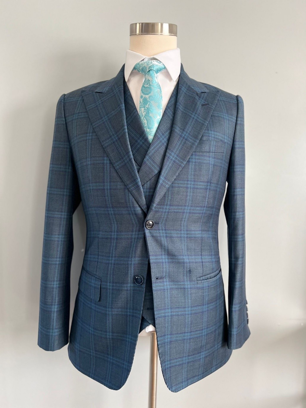 The Suit That Defines You: Why Go Custom for a Three-Piece Suit?